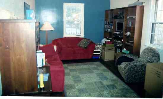 BEFORE: The crowded living room had little space for guests. (It's now a home office.)